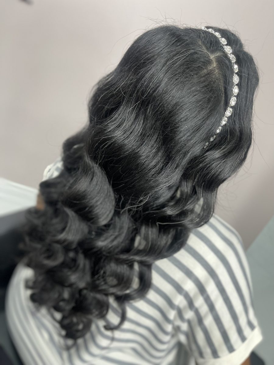 Long glam curls with a jewelled headband