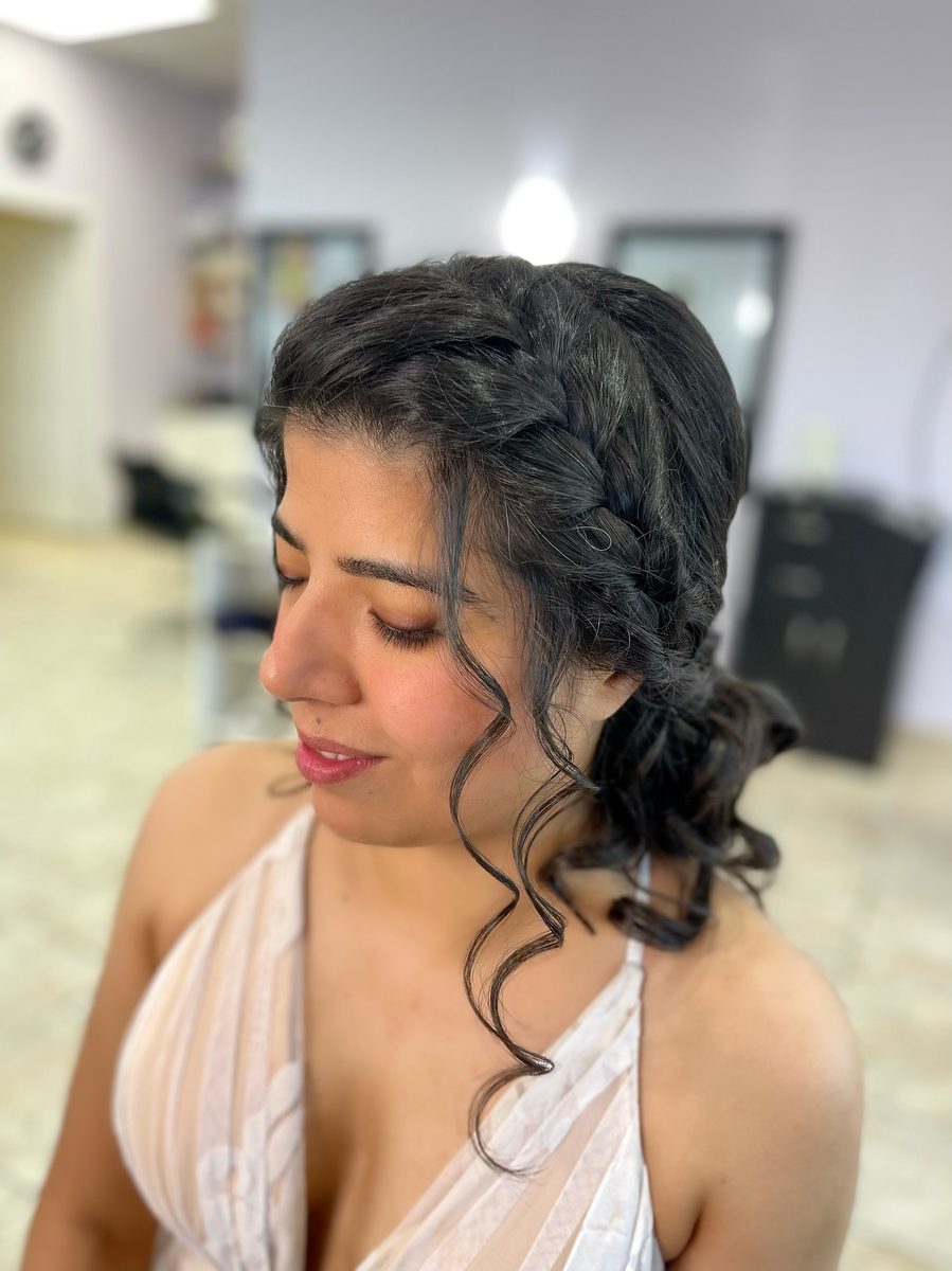 Side braid with loose curls